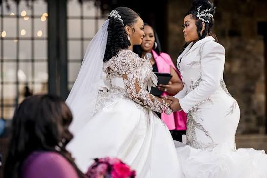 Jennifer Allen officiating the wedding of Da Brat and Judy