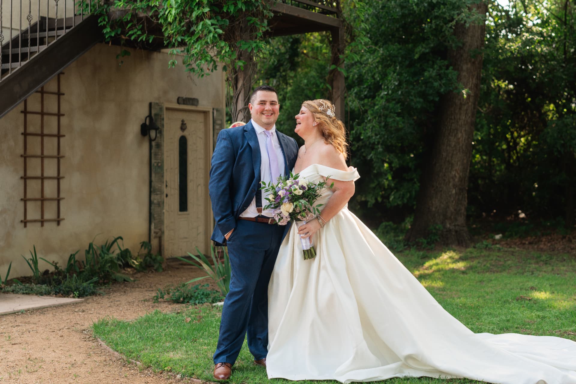 A Just Elope couple laughing together on their wedding day