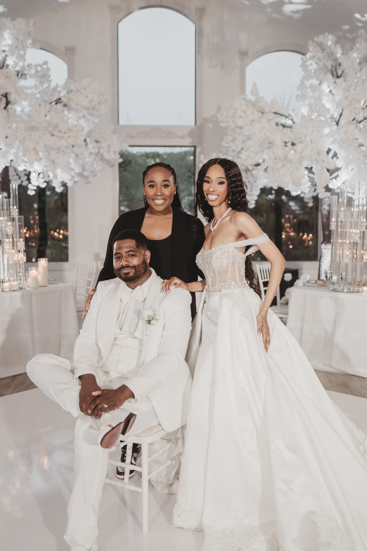 Jennifer Allen with a newly married couple