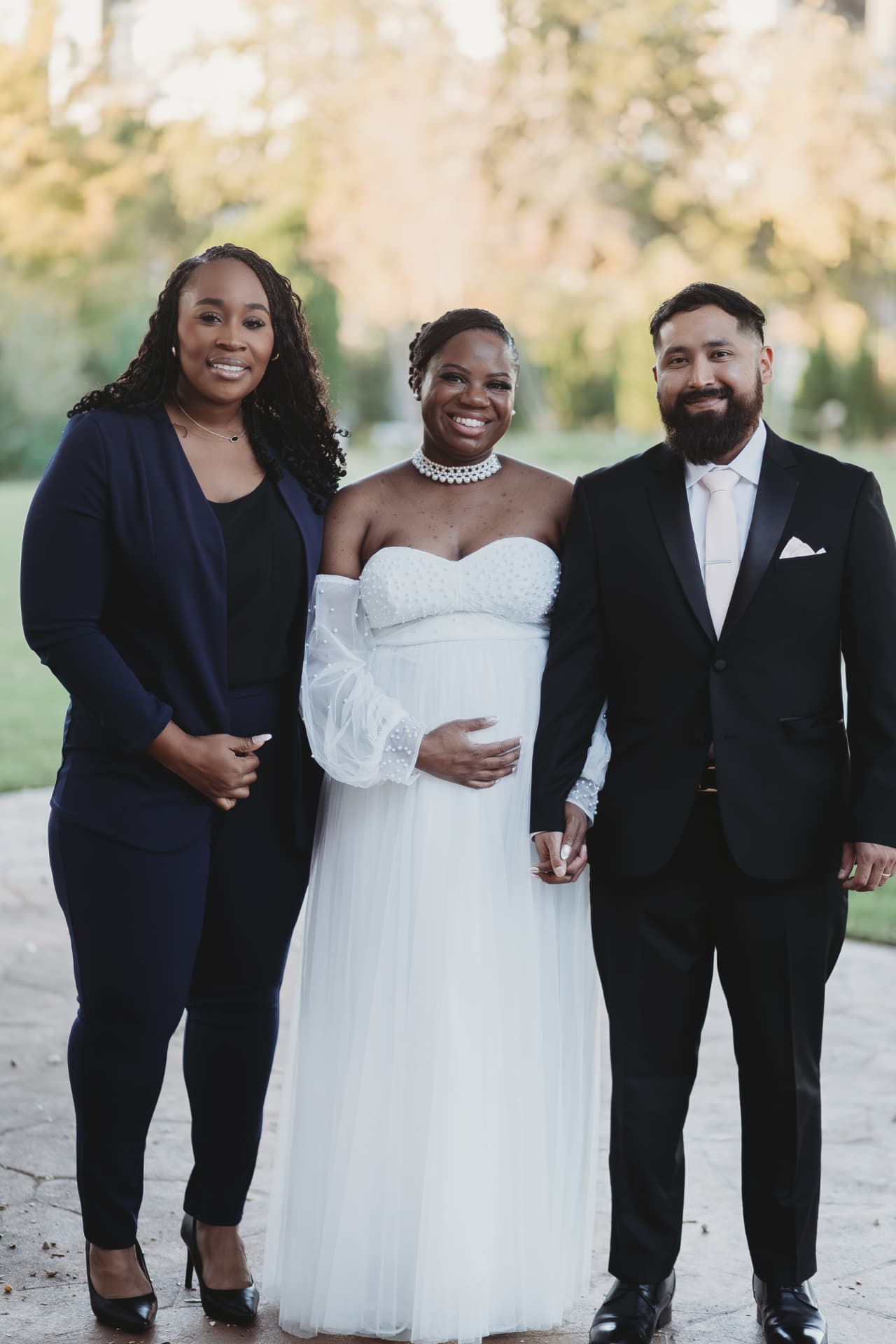 Jennifer Allen with a couple on their wedding day